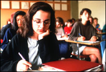 Photograph of students sitting in a classroom.