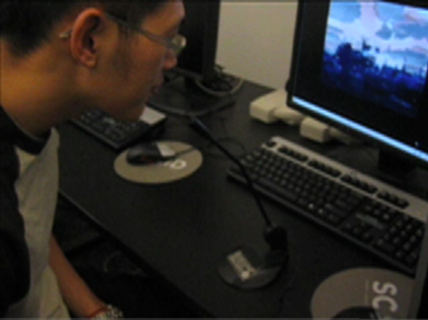 Photograph of a student blowing smog.